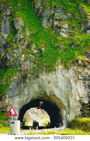 Road With Old Tunnel In Green Summer Mountains, Norway. National Tourist Andoya Route.