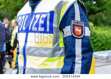 German Police Emblem Weared By An Officer. The German Word Polizei, Means Police.