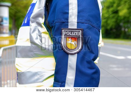 German Police Emblem Weared By An Officer. The German Word Polizei, Means Police.