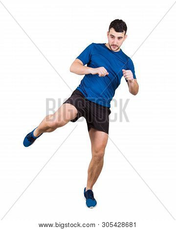 Full Length Portrait Of Young Man Athlete Or Fighter Making A Leg Kick Isolated Over White Backgroun