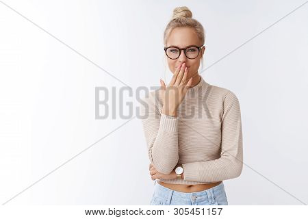 Attractive Young Glamour Girl Making Fun Over Coworker Giggling Smiling Holding Laugh As Smirking An