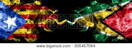 Catalonia Vs Guyana, Guyanese Smoke Flags Placed Side By Side. Thick Colored Silky Smoke Flags Of Ca