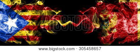 Catalonia Vs Montenegro, Montenegrin Smoke Flags Placed Side By Side. Thick Colored Silky Smoke Flag