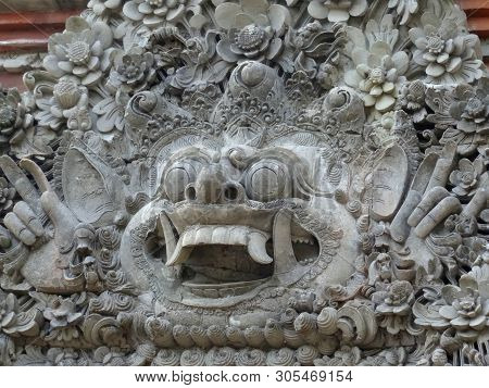 Ubud, Bali, Indonesia - 9th May 2018 : Beautiful In Stone Engraved Balinese Barong Mask Captured On 