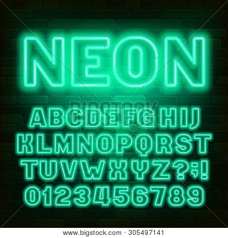 Green Neon Alphabet Font. Retro Light Bulb Capital Letters And Numbers. Brick Wall Background. Stock