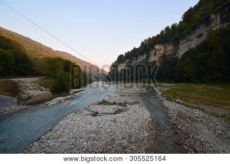 Panorama Of The Evening Mountain River With Stones In The Cherek Gorge In The Mountains Of The North