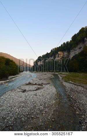 View Of The Fast Mountain River With Stones In The Cherek Gorge In The Mountains Of The North Caucas