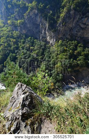 View Of The Deep Mountain Cherek Gorge With Wild Forest On The Rocks In The Mountains Of The North C