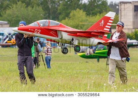 Balashikha, Moscow Region, Russia - May 25, 2019: Team Members Of Aviation Sports Club Rusjet Carry 