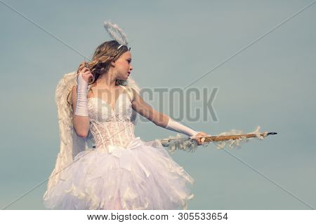 Cute Little Cupid Shoots A Bow. Cupid In Valentine Day. Arrow And Wings. Love Card. Bow And Arrow. C