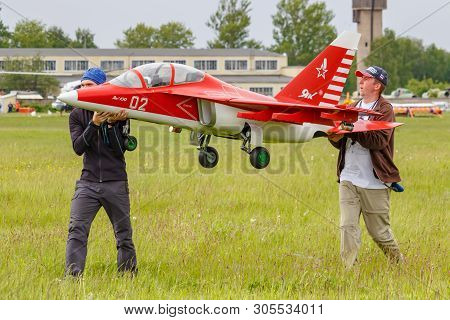 Balashikha, Moscow Region, Russia - May 25, 2019: Team Members Of Aviation Sports Club Rusjet Carry 