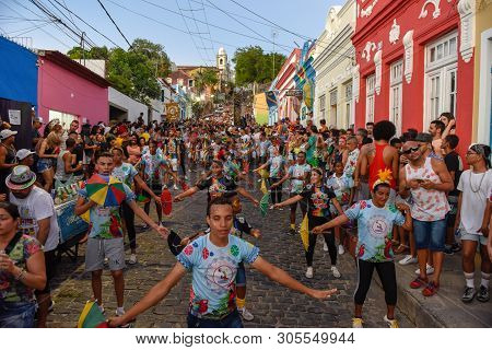 People Parade In The Streets During The Carnival Of Olinda On Brazil