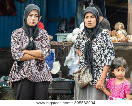 Makassar, Sulawesi, Indonesia - February 28, 2019: Terong Street Market. Three Generations Of Female