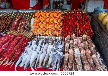Roasted, Fried And Raw Insects, Silkworms, Scorpions, Bugs, Snakes, Shrimps, Crabs, Langoustes, Dog 