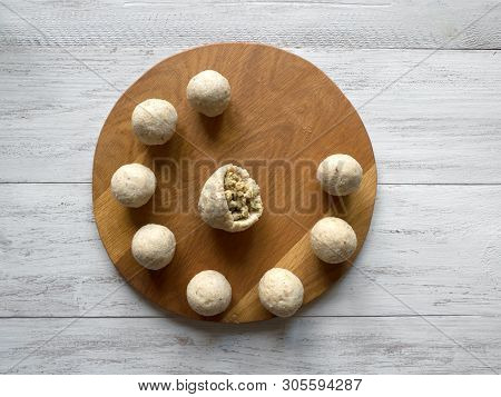 Raw Kibbeh. Cooking Of Arabic Meat Appetizer Kibbeh. Traditional Arabic Kibbeh With Lamb And Pine Nu