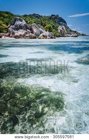 Shallow Water With Algal Plants In Front Of Unique Anse Source Dargent Tropical Beach, La Digue Seyc