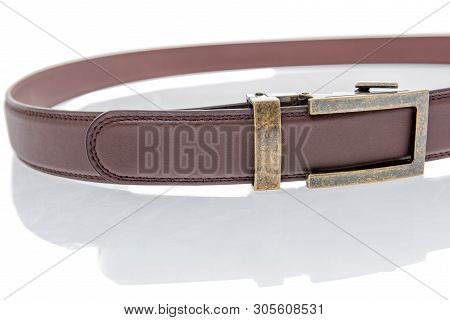 A Belt Witout Belt Holes And Uses Mico Adjustable Ratchet System To Keep The Buckle In Place.
