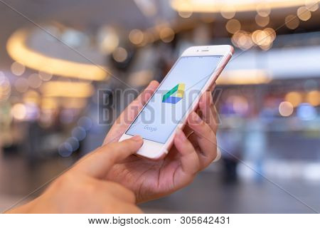Chiang Mai, Thailand - May.10,2019: Woman Holding Apple Iphone 6s Rose Gold With Google Drive Apps O
