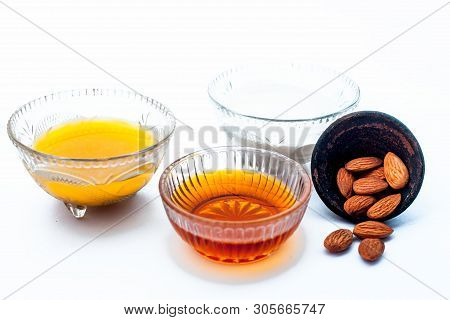 Natural Ex-foliating Face Mask Isolated On White In A Glass Bowl I.e. Raw Milk Well Mixed With Honey