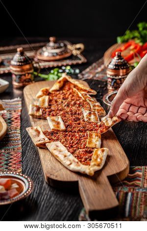 Traditional Turkish Cuisine. Turkish Pizza Pita With Meat. Turk Pidesi Or  Sucuk Pide. Beautiful Ser