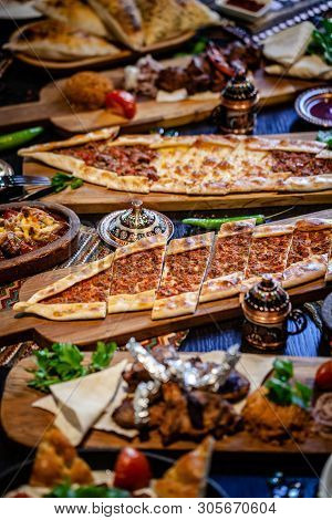 Traditional Turkish Cuisine. Pizza, Pita, Pidesi, Sucuk, Hummus, Kebab, Bulgar. Many Dishes On The T