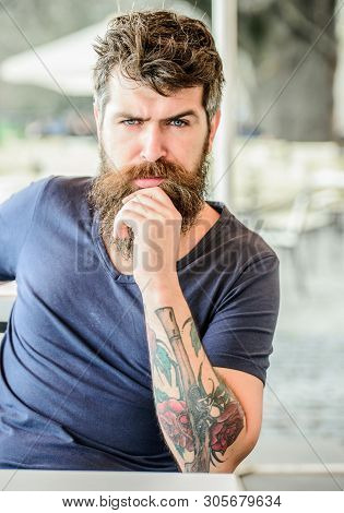 Portrait Of Brutal Handsome Male Model. Waiting And Tinking. Thoughtful Man Outdoor. Facial Skin Car