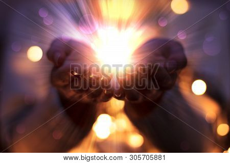 Magic Particles On The Palms Of A Woman, The Flow Of Magical Energy Emanating From Female Hands.