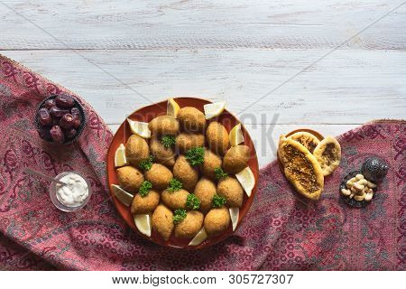 Arabic Meat Appetizer Kibbeh. Traditional Arabic Kibbeh With Lamb And Pine Nuts.