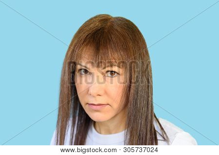 Middle Age Woman Looking, Inquisitive Glance.suspicious Woman, Skeptic Expression.