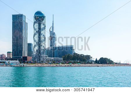 Batumi, Georgia - 08.05.2019: View From Sea To Resort Town Cityscape With Skyscrapers And Alphabet T