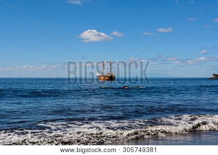Beautiful And Quiet Beach Masca. Pirate Ship Coming To The Island.. Volcanic Island. Mountains Of Th