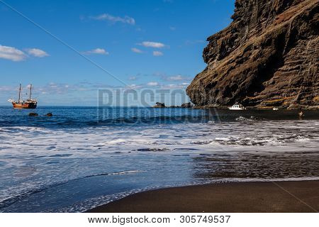 Beautiful And Quiet Beach Masca. Pirate Ship Coming To The Island.. Volcanic Island. Mountains Of Th