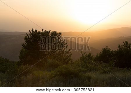 Beautiful Landscape In The Mountains With The Sun At Dawn. Mountains At The Sunset Time. Azerbaijan 