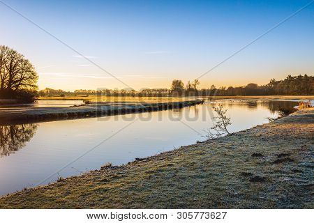 Curve In The Dutch River Mark On A Windless Day In Winter. The Photo Was Taken On A Sunny Day Early 
