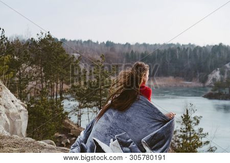 Young Beautiful Girl Posing On A Background Of Lake