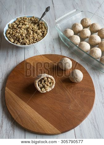 Cooking Of Arabic Meat Appetizer Kibbeh. Traditional Arabic Kibbeh With Lamb And Pine Nuts.