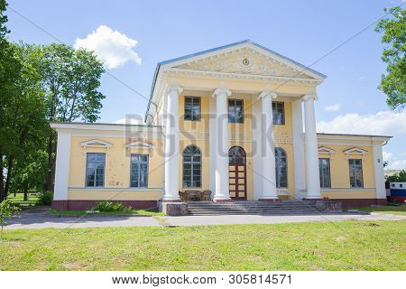 City Jelgava, Latvian Republic. Old Yellow Manor Houses And Garden. Jun 9. 2019. Travel Photo.