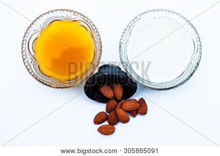 Milk Face Pack For Natural Instant Glow Isolated On White I.e. Raw Milk Well Mixed With Powdered Alm