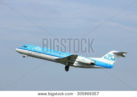Amsterdam, The Netherlands  -  June 2nd, 2017: Ph-kzc Klm Cityhopper Fokker F70 Taking Off From Pold
