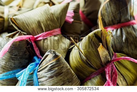 Close-up View Of Steamed Asian Rice Dumplings (zongzi) With Copy Space, A Traditional Food Eaten Dur
