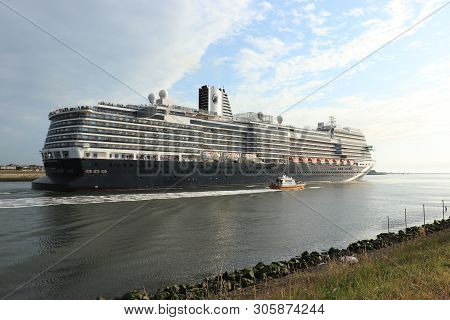 Ijmuiden, The Netherlands -june, 9th 2019: Nieuw Statendam Leaving Ijmuiden Sea Lock, Joined By Pilo