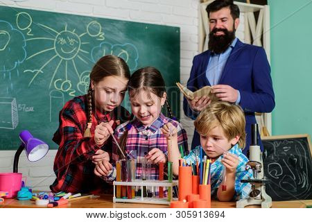 Children Making Science Experiments. Education. Science And Education. Chemistry Lab. Happy Children