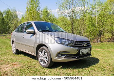 Asha, Russia - May 10, 2019: Grey Motor Car Lada Granta At The Countryside.