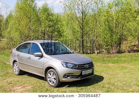 Asha, Russia - May 10, 2019: Grey Motor Car Lada Granta At The Countryside.