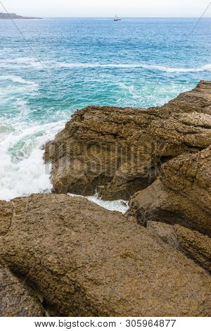 raging and furious sea breaking against the rocks, Cantabrian Sea in the North of Spain