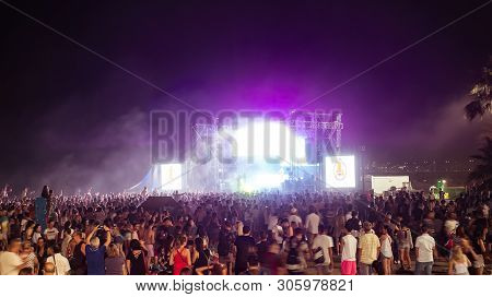 Malaga, Spain - June 23, 2018. People On The Malagueta Beach On Night Of San Juan