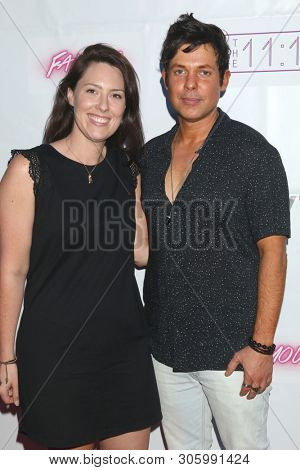 LOS ANGELES - JUN 9:  Sarah Findley, Michael Leoni at the 