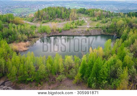Beautiful Spring Mountain Landscape. Quarry In The Mountains By The Lake.