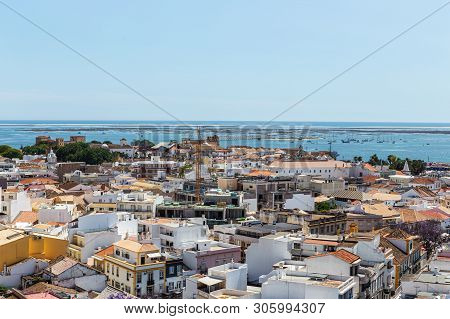 Aerial. The Southern City Of Portugal Faro View From The Top.