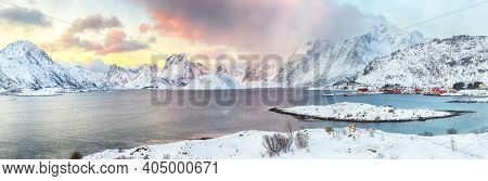 Picturesque Morning View Of Torsfjorden Fjord With Fredvang  Village And Snowy Mountain Peaks At Bac